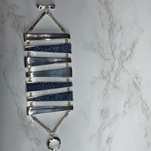 Robert Lee Morris silver tone bracelet with blue stone like accents